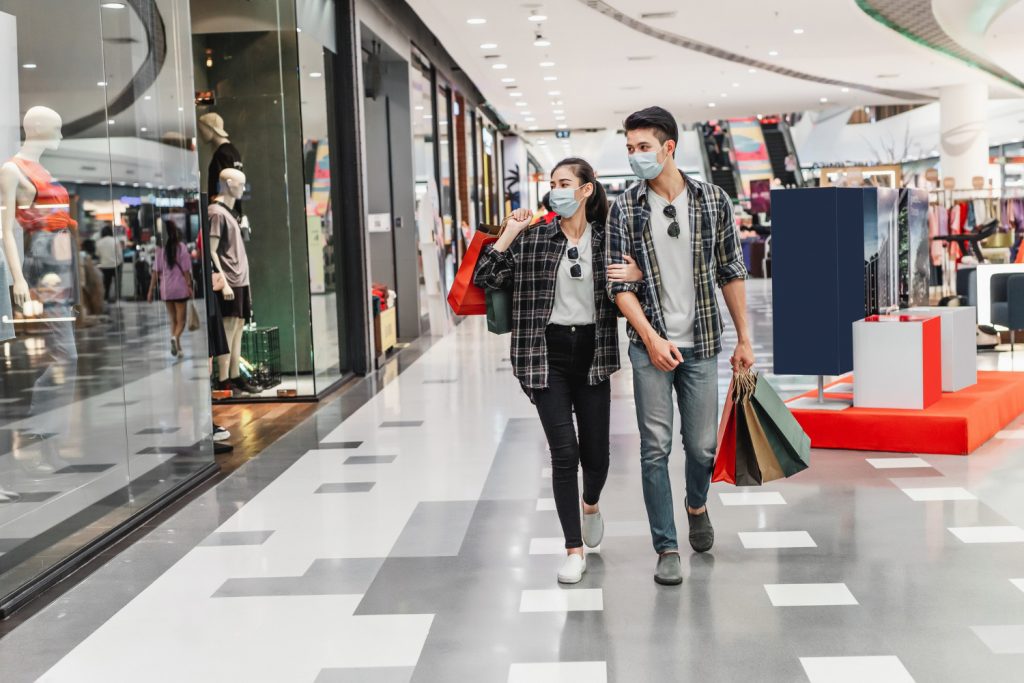 young couple in shopping mall